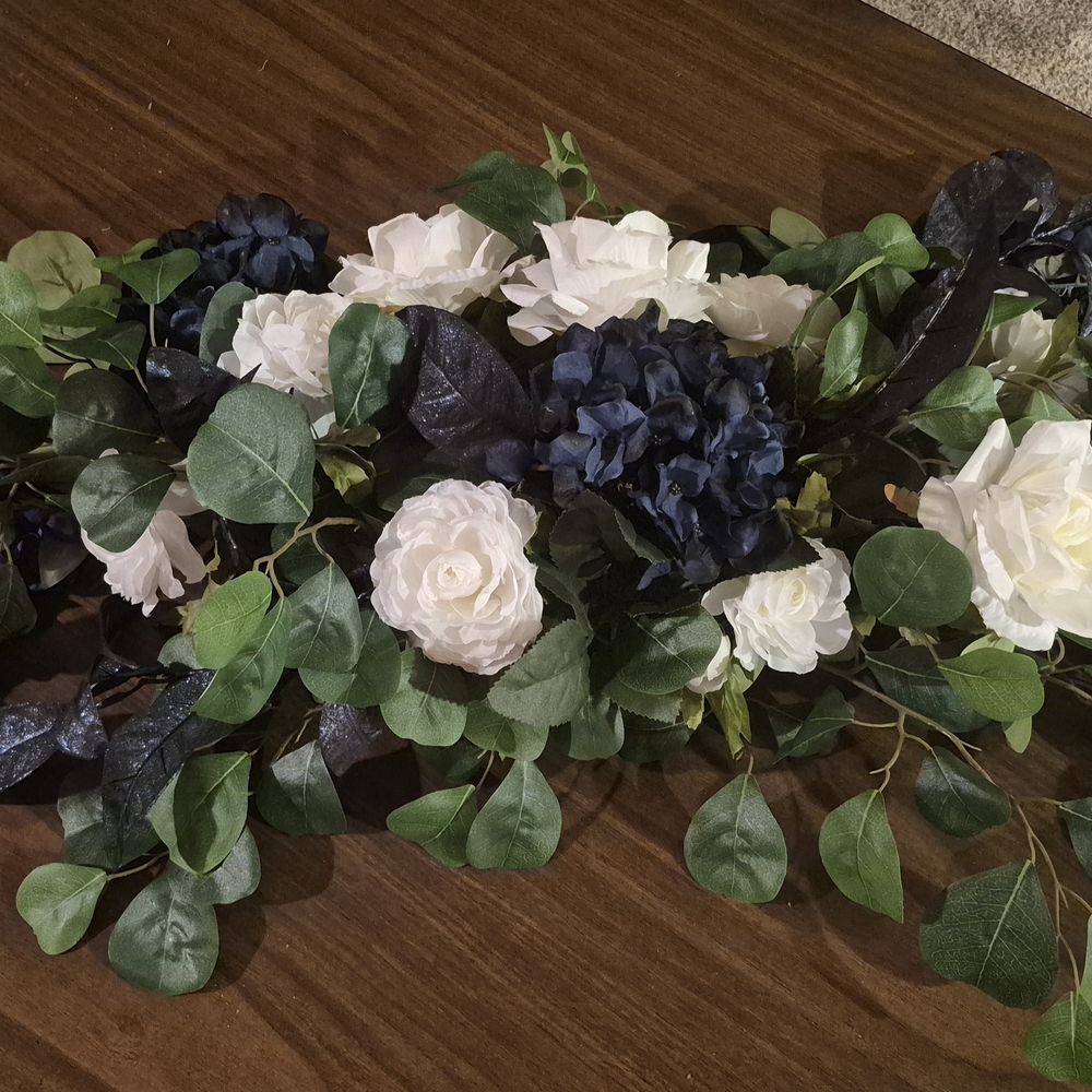 Elegant Floral Arrangement with White and Blue Accents